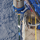 A deck crew member setting a barrel clamp for recovery .